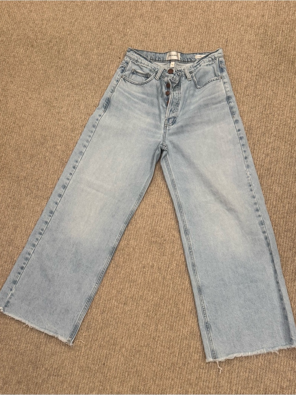 Frame Denim Light Wash High-Rise Wide Leg Jeans with Raw Hem